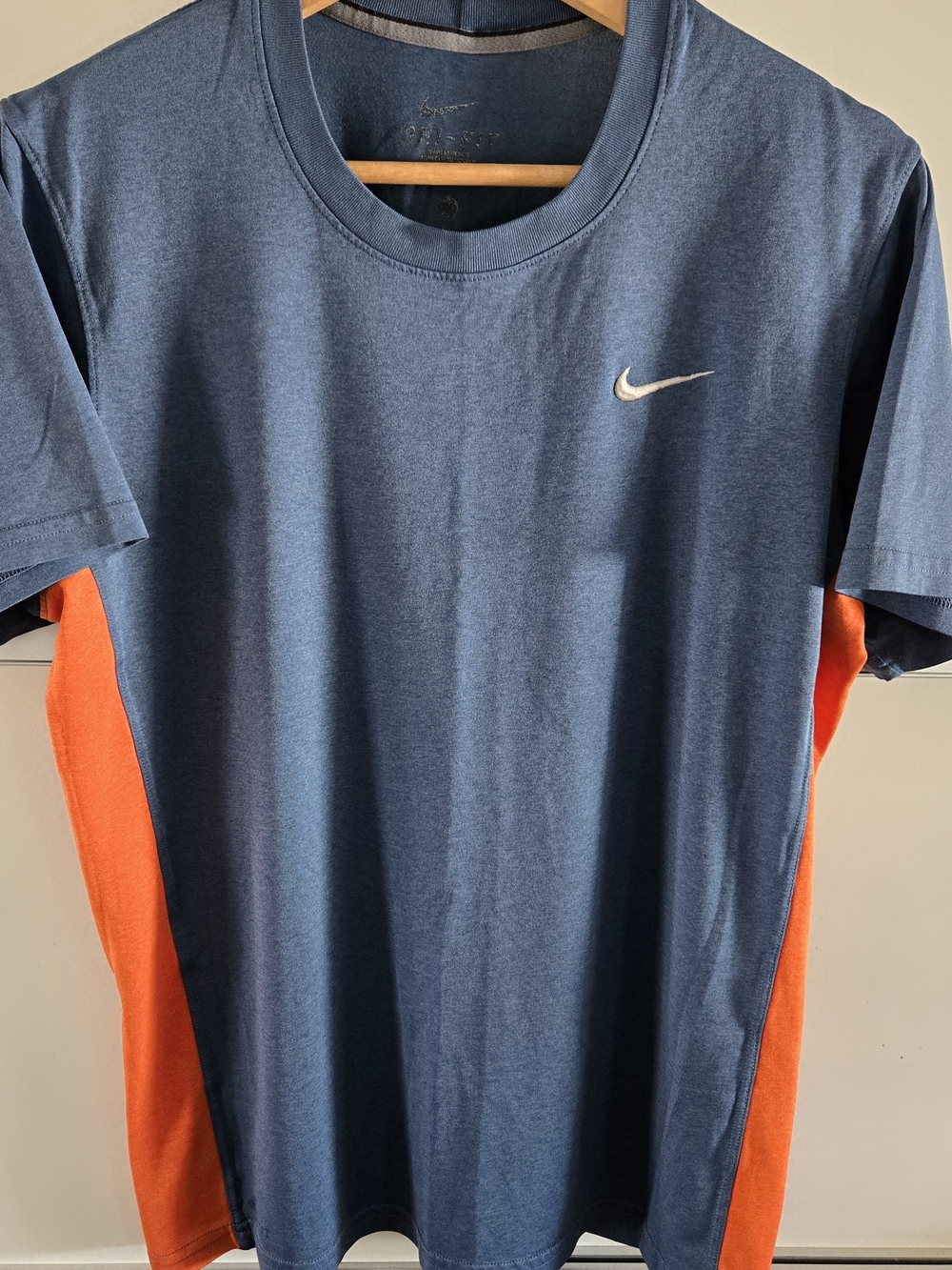 Nike Men’s Navy Blue Tee with Orange Side Panels and White Swoosh